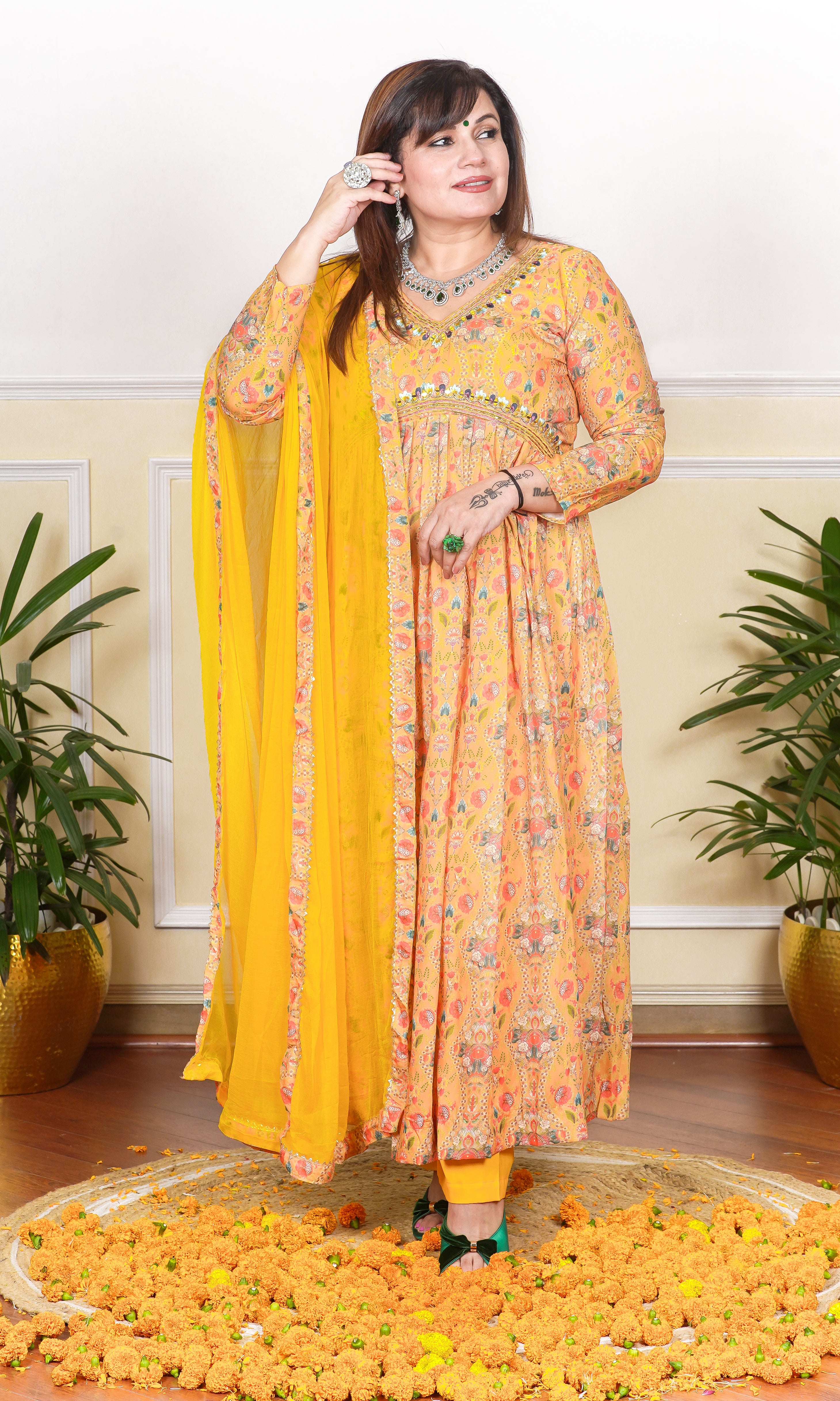 YELLOW FLORAL PRINTED MULTICOLOUR SEQUIN, THREAD AND CUTDANA EMBROIDERED NECKLINE FLARED KURTA WITH PANTS AND DUPATTA