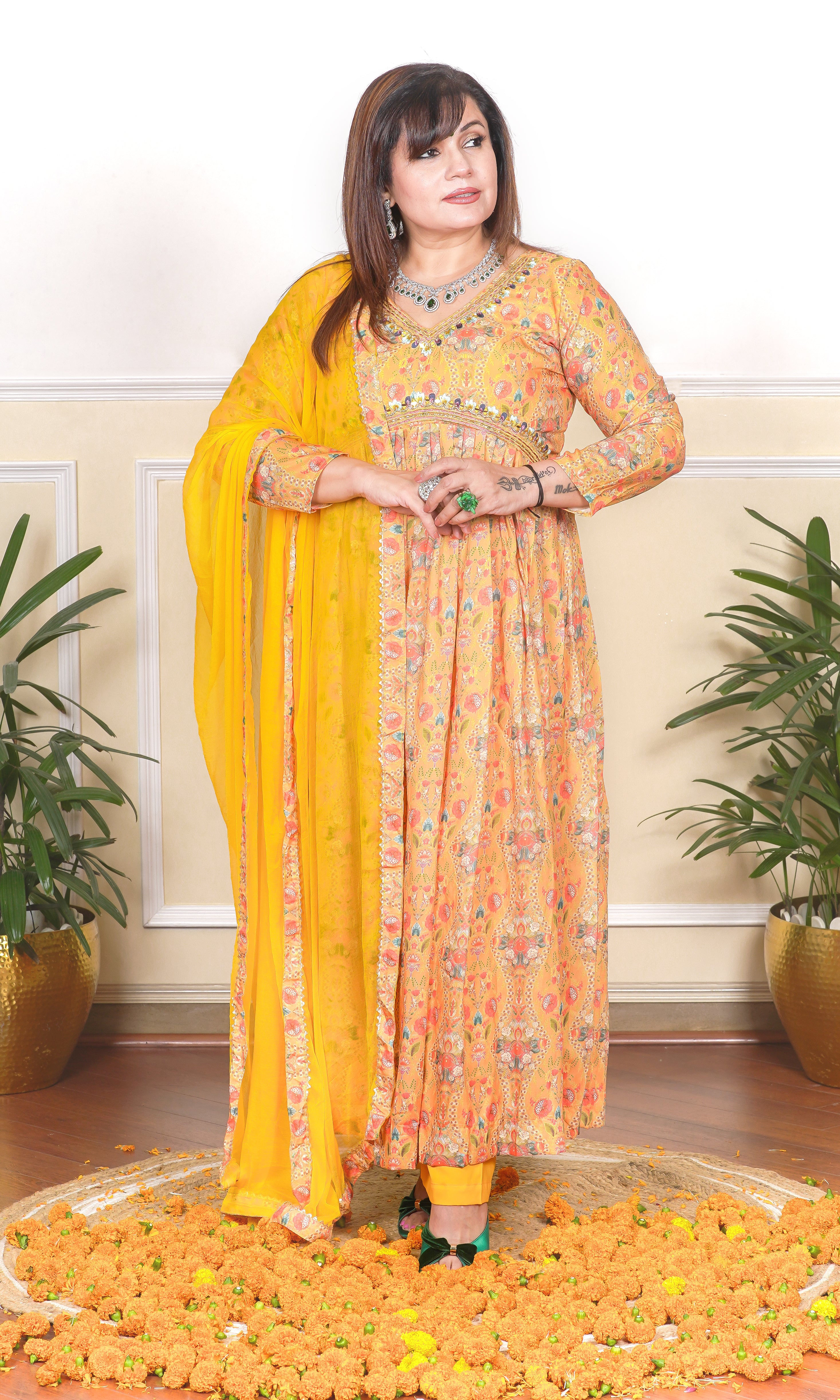 YELLOW FLORAL PRINTED MULTICOLOUR SEQUIN, THREAD AND CUTDANA EMBROIDERED NECKLINE FLARED KURTA WITH PANTS AND DUPATTA